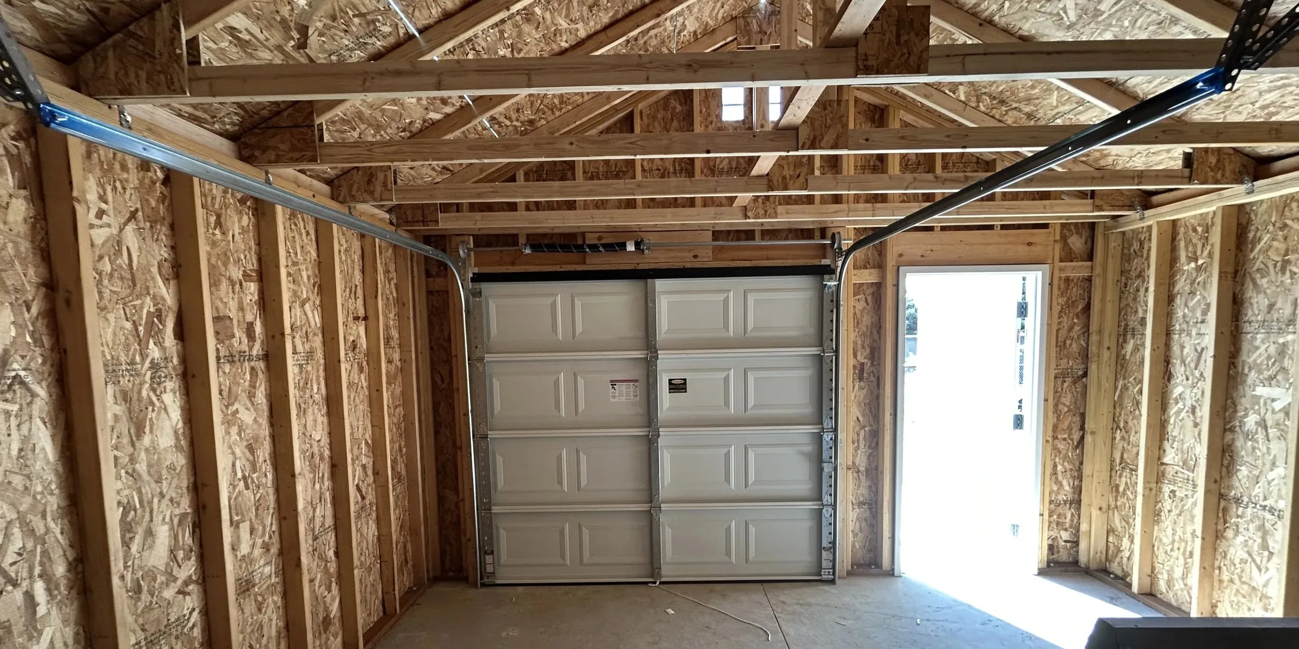 Garage Door Panel Replacement: Costs, Repair Options, and What Utah Homeowners Need to Know Garage door installation showing panel replacement and professional service