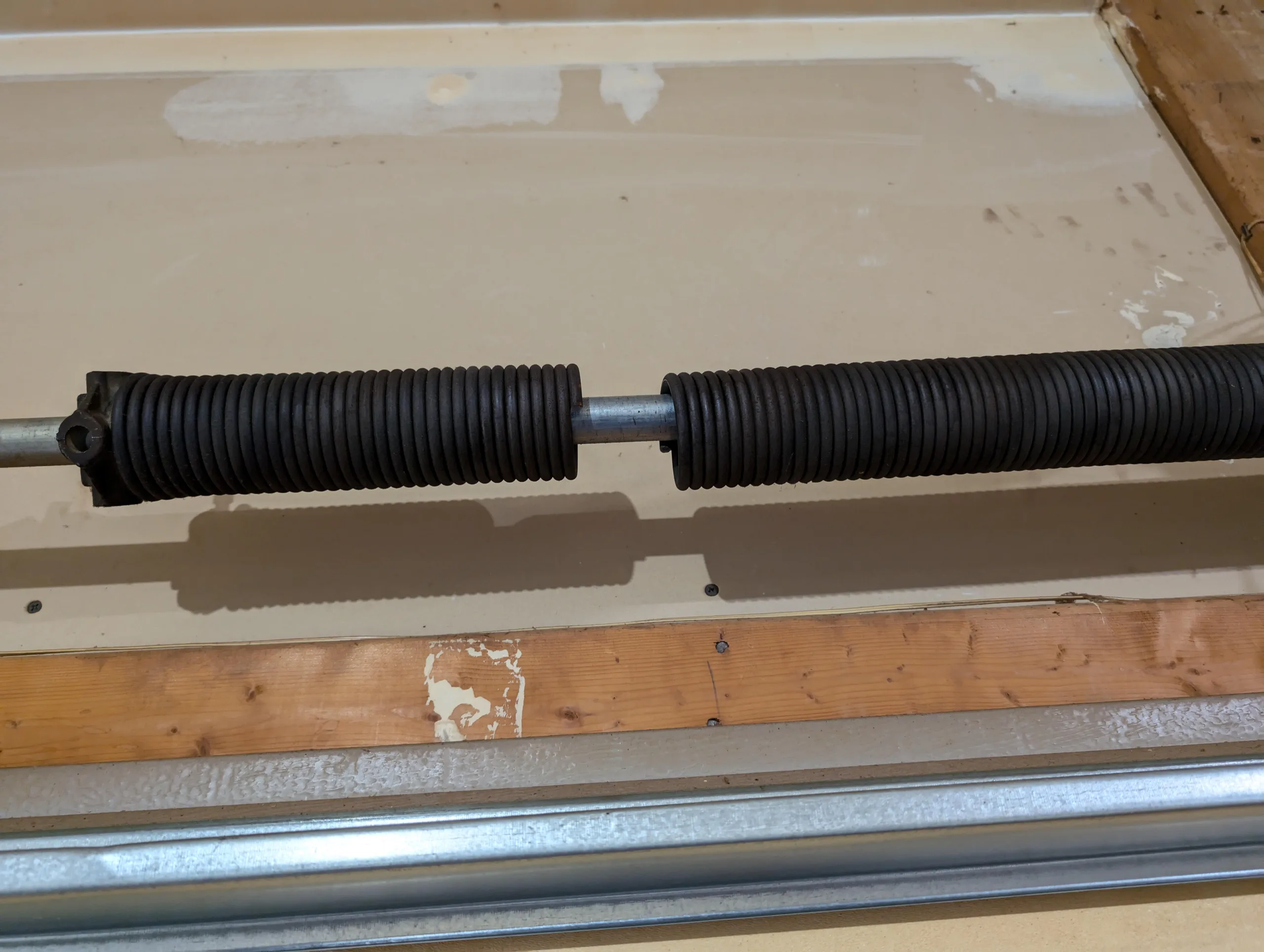 Common Myths About Garage Door Spring Replacement broken_garage_spring