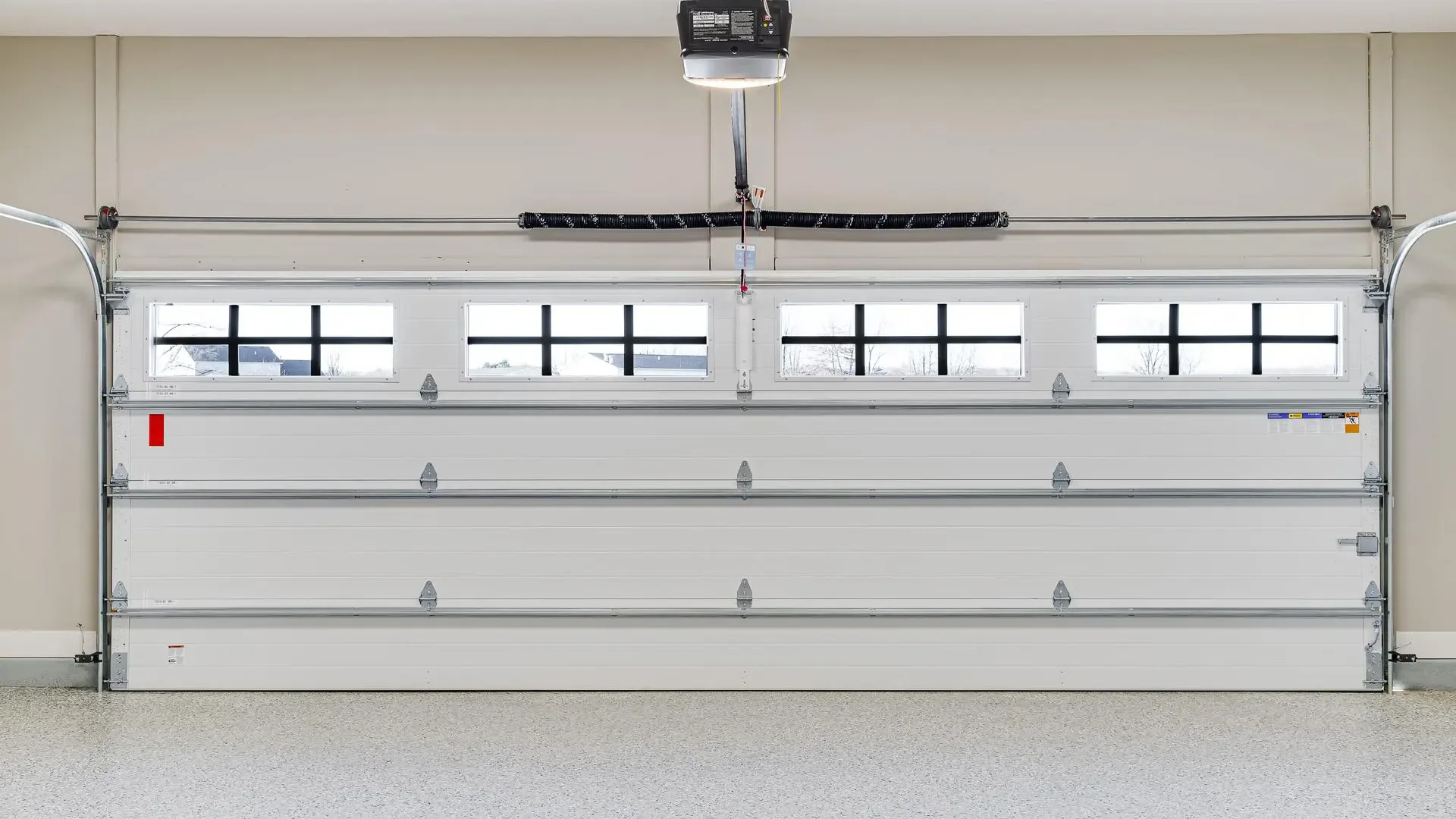 Torsion vs Extension Garage Door Springs: What Utah Homeowners Need to Know Garage door spring mechanism showing torsion spring system