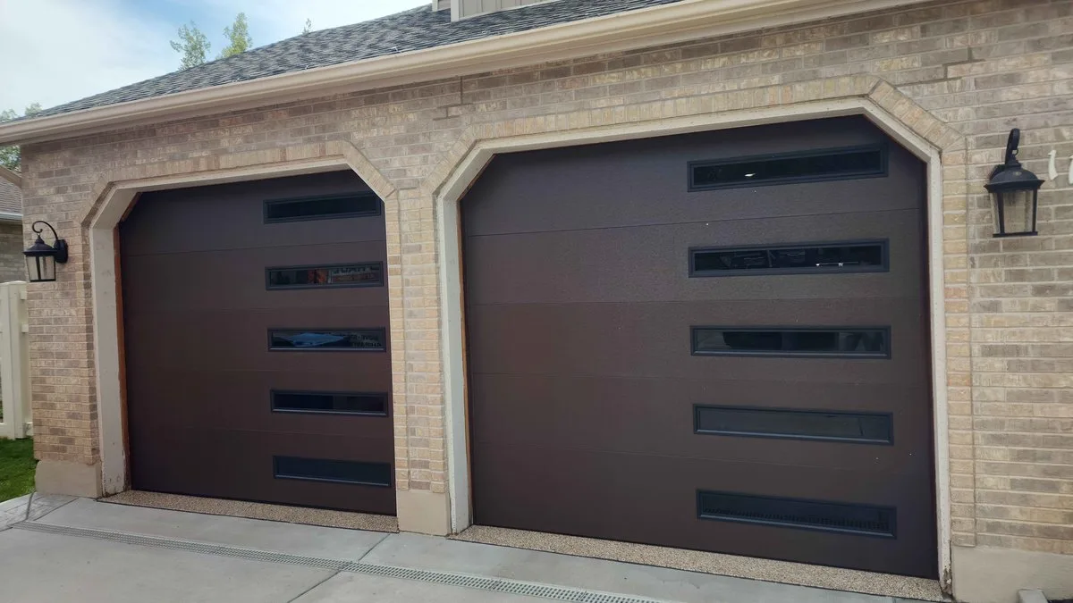 Does a New Garage Door Increase Home Value? The Complete 2026 Guide for Utah Homeowners Beautiful new garage door on a Utah home increasing curb appeal and property value