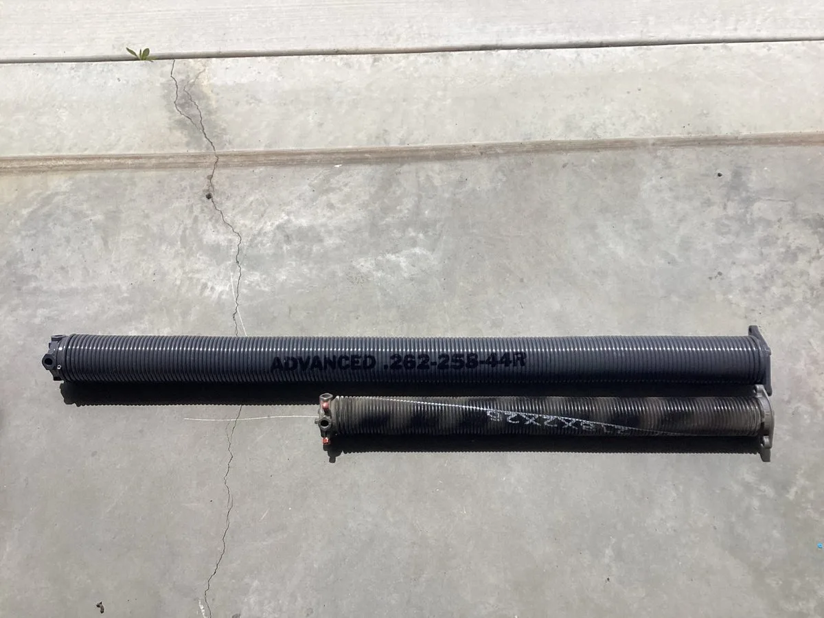 How Long Do Garage Door Springs Last? The Complete Lifespan Guide for Utah Homeowners Comparison of new versus worn garage door torsion springs