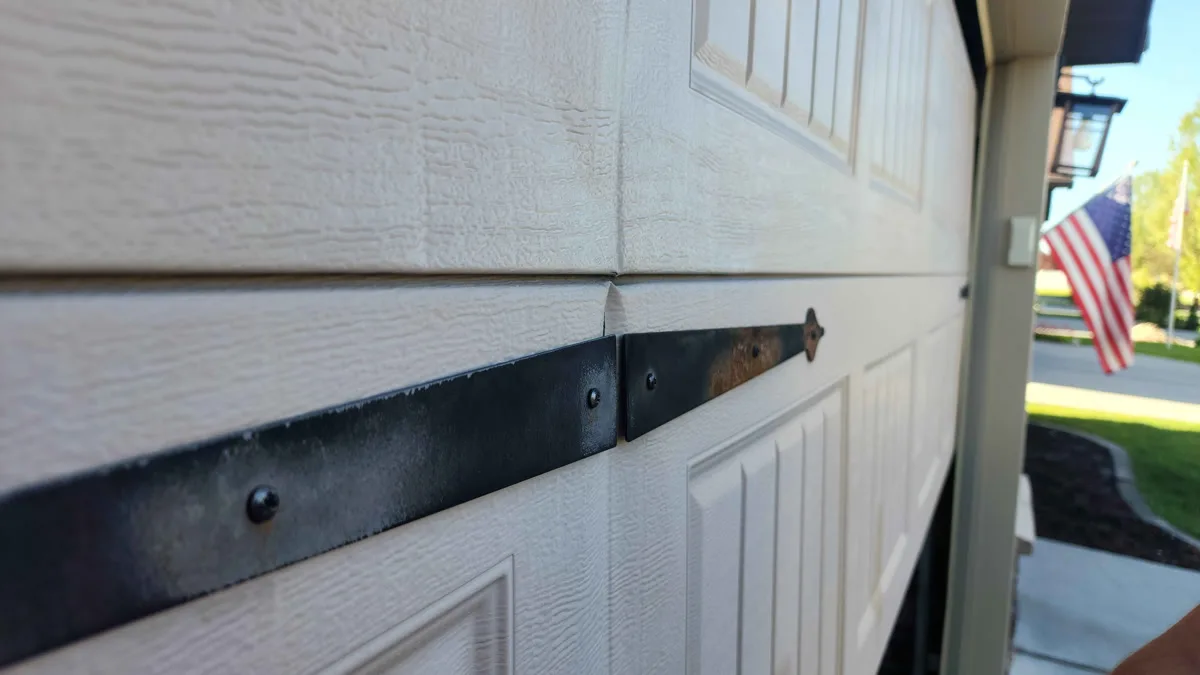 Garage Door Sagging, Bowing, or Warping? Every Cause, Fix, and Prevention Tip for Utah Homeowners Garage Door Sagging, Bowing, or Warping? Every Cause, Fix, and Prevention Tip for Utah Homeowners