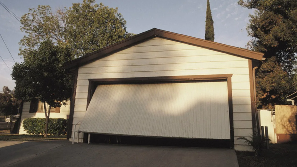 Tilt-Up (One-Piece) Garage Doors: The Complete Guide to Repair, Replacement, and Converting to Sectional (Utah Guide) Tilt-Up (One-Piece) Garage Doors